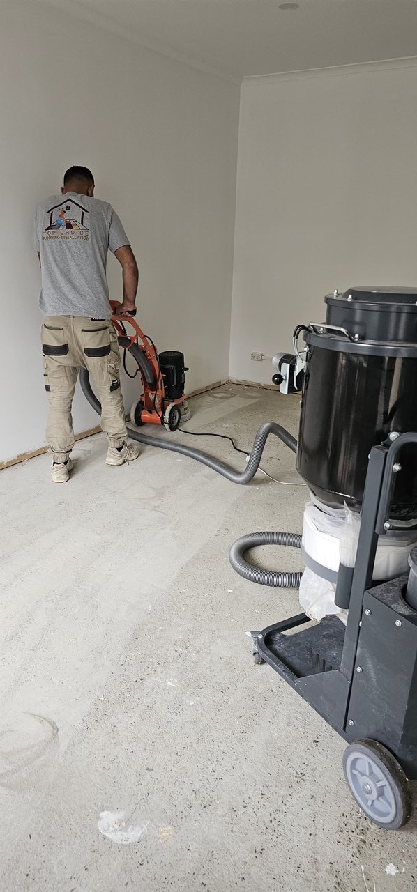 Dust-Controlled Concrete Grinding & Subfloor Prep